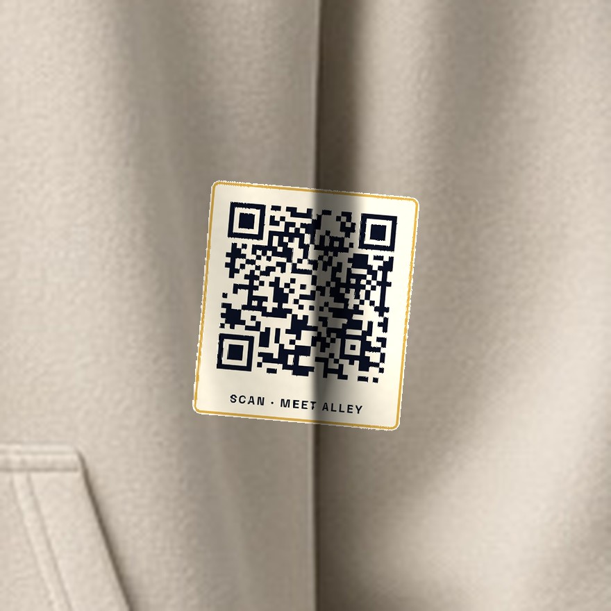 Close-up of the small Saturday QR code printed on the hoodie. It opens saturdayforthewin.com/scan.html.