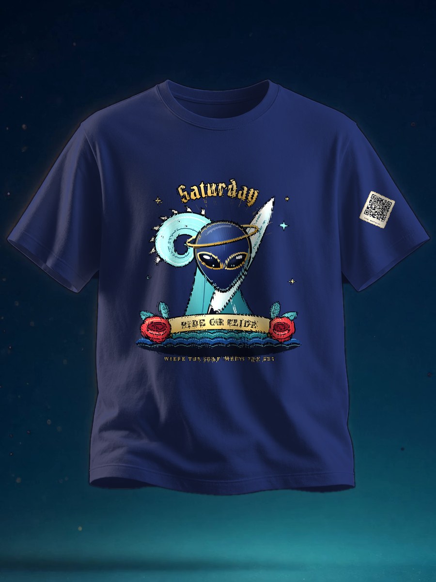 Front view of a navy unisex Saturday tee printed with Saturday Flash: tattoo-flash art of Alley the alien head with the gold ring, a curling hologram-teal wave, a surfboard, two red roses and a gold Ride or Glide banner. A small Saturday QR patch sits on the left sleeve.
